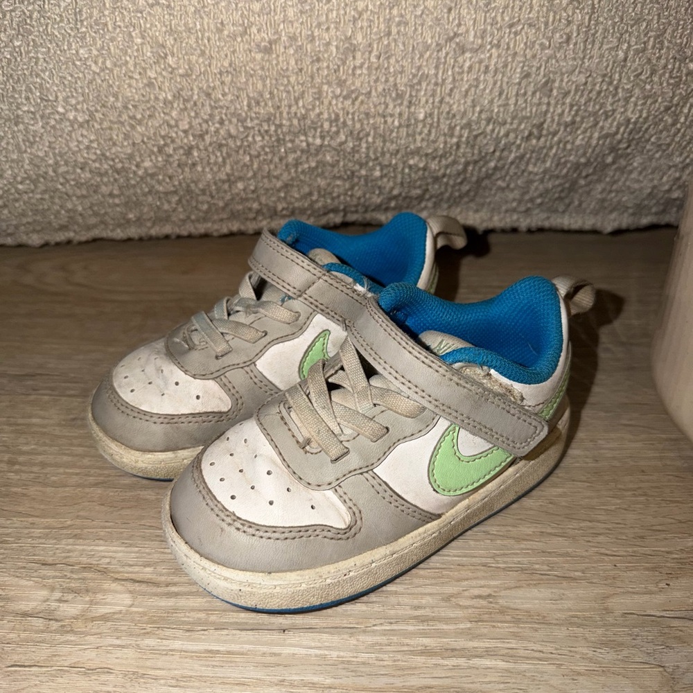 Nike Kids Sneakers in White and Blue with Green Accents
